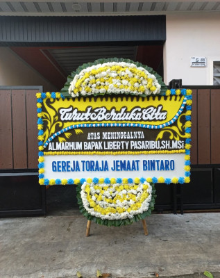 Papan Bunga Duka di Seberuang
